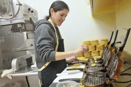 Tania Ciano makes pizzelles in the kitchen at Leonard Labriola's Italian Store in Monroeville.