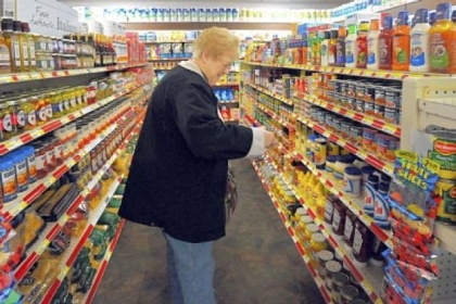 Donna Freeman of Youngwood makes a quick visit to shop for condiments at the Youngwood Corner Market. Freeman calls the neighborhood market a "lifesaver" for her.