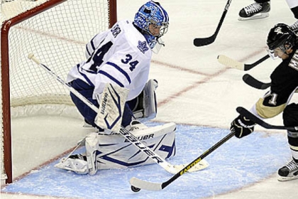 Toronto goaltender James Reimer stops a shot by Penguins' Evgeni Malkin in the second period last night at Consol Energy Center.