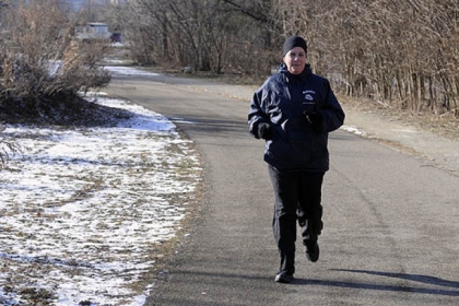 Joanne Mule of Bellevue runs Thursday on the Three Rivers Heritage Trail in South Side Riverfront Park. "It's never too cold to run," she said.