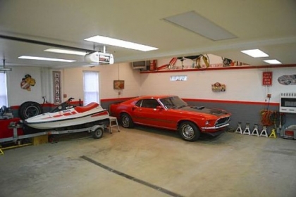 About 10 years ago, the current owner, a car enthusiast, added a 32- by 30-foot garage with room for up to four cars. The heated garage has an insulated garage door and a compressed air system to run power tools