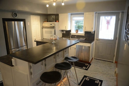 In the kitchen is a motion detector that turns on lights at the base of the cabinets.