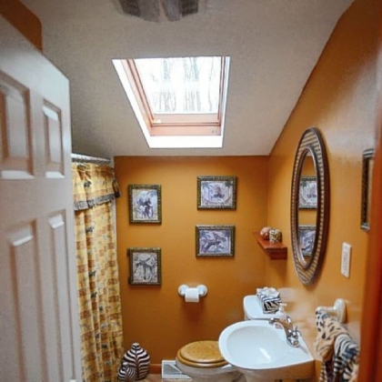 The upstairs bathroom features a skylight.