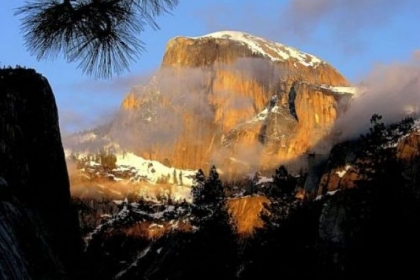 The Half Dome at sunset as seen from The Ahwahnee Hotel in winter.