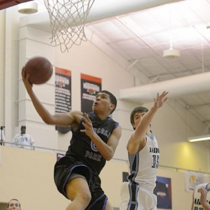 Lincoln Park's Antonio Kellum drives to the basket during his team''s 66-64 overtime loss to Seneca Valley Sunday in the Pittsburgh Basketball Club Classic at La Roche College.