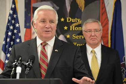 Governor Tom Corbett, left, announces the 2013-14 budget for Pennsylvania State Police as Frank Noonan,  Commissioner Pennsylvania State Police looks on. Mr. Corbett received a negative job approval rating in the Quinnipiac University poll.