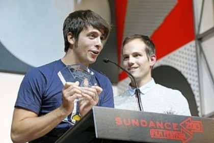 Documentary subject Rocky Braat, left, and director Steve Hoover accept the Grand Jury Prize: U.S. Documentary for "Blood Brother" during the 2013 Sundance Film Festival Awards Ceremony on Saturday.
