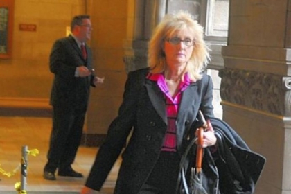 Jamie Pavlot arrives Tuesday at the county courthouse.