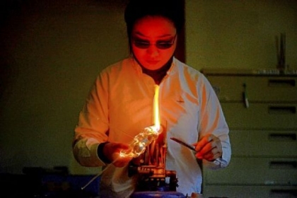 Eunsuh Choi works on creating a piece for her exhibition at the Pittsburgh Glass Center.
