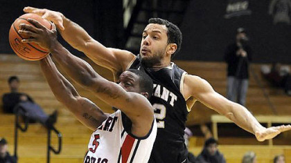 Robert Morris' Anthony Myers-Pate, left, is defended by Bryant's Dyami Starks in the first half Thursday night.