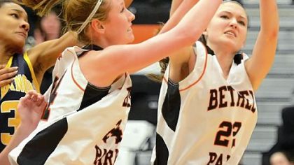 Bethel Parks Samantha Simpson, right, and Paige Kochka-Puskar try to corral a loose ball Thursday against Mt. Lebanon.
