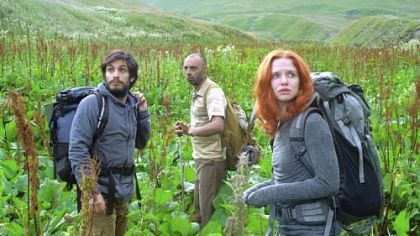 Gael Garcia Bernal and Hani Furstenberg are led through treacherous terrain by mysterious mountaineer Bidzina Gujabidze, center, in "The Loneliest Planet."