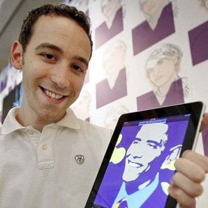 Joshua Jefferey, director of digital engagement for The Andy Warhol Museum, sits in the lobby of The Warhol in July 2011. He is showing an image of President Obama on his iPad that he had put through an app offered by the museum that enables people to "silk-screen" photos on iPhones and other portable devices.