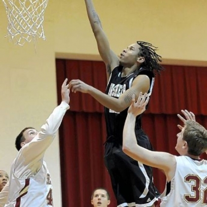 Brashear's Tyler Smith takes it to the rim during a non-league victory against Serra Catholic.