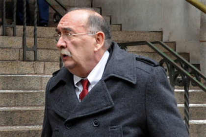 Former corrections officer Harry F. Nicoletti Jr. walks out of the Allegheny  County Courthouse today, after he was found guilty on 27 of 80 criminal counts.