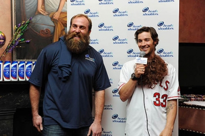 Steelers defensive end Brett Keisel reveals Los Angeles Angels pitcher C.J. Wilson as new "Mane Man" during a Super Bowl media event on Wednesday in New Orleans.