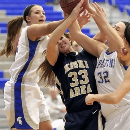 Hempfield's Leah Knizner and Casey Hamilton fight for a rebound against Kiski Area's Maddie Antone Thursday night at Hempfield.