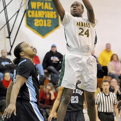Seton-LaSalle's Levi Masua scored 15 points against Washington in the Rebels' 63-50 victory.