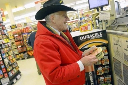 Lou Sander buys lottery tickets Thursday at Shop 'n Save in Pines Plaza, Ross.