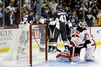 Celebration ensues after Brandon Sutter was one of several Penguins to score against New Jersey Devils goalie Martin Brodeur in the second period of Saturday's win at Consol Energy Center.