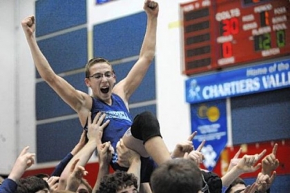 Burrell's Jason Roberts is hoisted onto the shoulders of his teammates after winning at 106 pounds and clinching the WPIAL Class AA title Saturday -- the Buccaneers' seventh in a row.