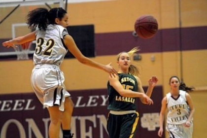 Seton-LaSalle's Julie DeKlaven passes in front of Steel Valley's Cece Dixon.