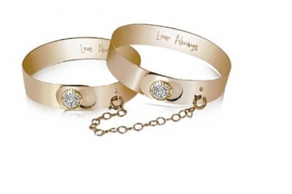 Yellow gold and diamond Love Always double-chain bracelet, $8,100.