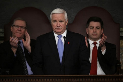 Gov. Tom Corbett delivers his budget proposal today in Harrisburg. Also pictured: Rep. Sam Smith, R-Jefferson (l), and Lt. Gov. Jim Cawley.