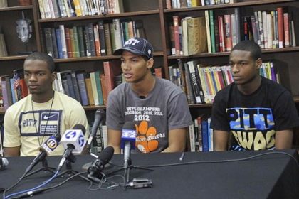 Tyler Boyd, center and his Clairton teammates, Terrish Webb, left, and Titus Howard, right, all plan to sign letters of intent to play football for the University of Pittsburgh.