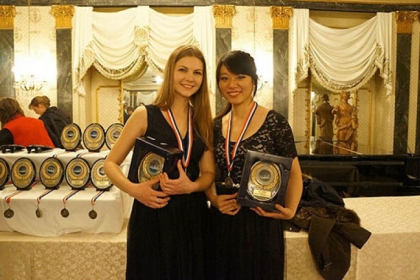 Mary Pappert School of Music students Anna Kovalevska, left, and Yuting Zhou won first place at last month's 15th annual United States International Duo Piano Competition in Colorado Springs.