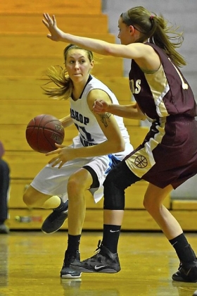 Bishop Canevin's Erin Waskowiak, driving to the basket against Chartiers-Houston, leads the Crusaders in scoring.