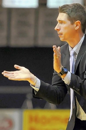 Robert Morris' Andrew Toole applauds a play as his team takes on Saint Francis.