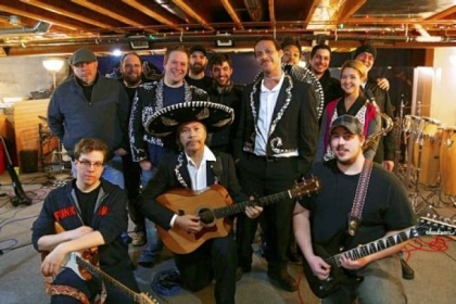 Members of the Amigos Live! band, Guaracha and Miguel's Mariachi Fiesta gathered at Orion Czarnecki's Studio O in Beaver Falls for rehearsal. Mr. Czarnecki is in the third row, center.