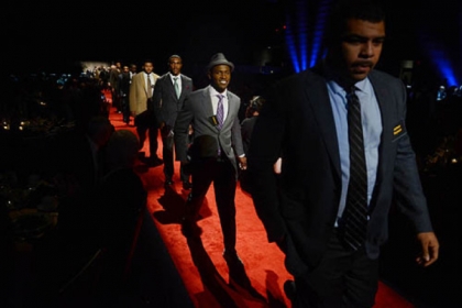 Steelers wide receiver Antonio Brown, second from right, walks the red carpet with fellow athletes.
