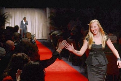 Penn State soccer player Taylor Schram walks the red carpet at the David L. Lawrence Convention Center.