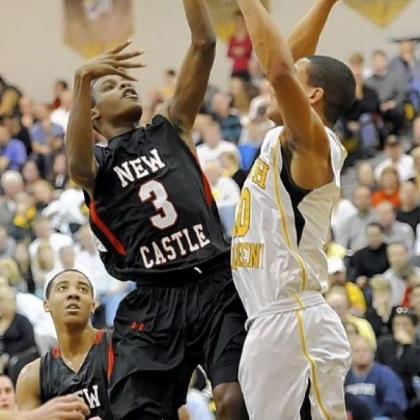 New Castle's Drew Allen gets a shot up against North Allegheny's Elijah Zeise.