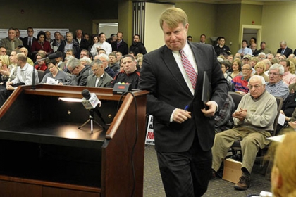 Allegheny County Executive Rich Fitzgerald prepares to speak at the public meeting Thursday at Robert Morris University. He announced legislation for a contract between the Allegheny County Airport Authority and Consol Energy.