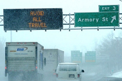Signs on Interstate 291 in Springfield, Mass. warning of dangerous travel today. Massachusetts Gov. Deval Patrick declared a state of emergency and banned travel.