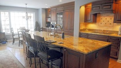 After remodeling, the kitchen in this Mt. Lebanon home was able to accommodate an island and access to the adjacent dining room was widened.