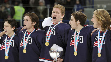 Team USA players sing the national anthem after their victory in the gold medal match against Sweden at  the World Junior Ice Hockey championship in Ufa, Russia, today.