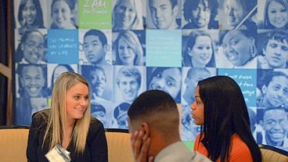 Melissa Walsh, left, 20, of Brookline conducts a mock interview with Phill Ross, 20, of Beltzhoover and Dana King, 20, of Pittsburgh during the Pittsburgh Promise career training workshop at the Rivers Club, Downtown, on Friday.
