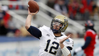 Pitt quarterback Tino Sunseri warms up today before the BBVA Compass Bowl NCAA college football game against Mississippi now underway at Legion Field in Birmingham.