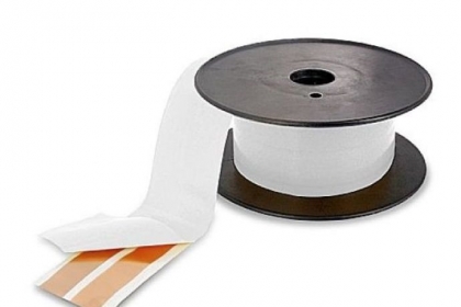 Sewell Ghost Wire Super Flat Adhesive Speaker Wire comes on a spool and when you look at the roll, it looks like white plastic tape.