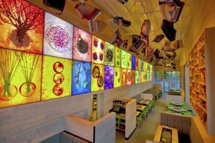 The Collections Cafe at Chihuly Garden and Glass features the artist's work and things he has collected over the years, like the accordions hanging from the ceiling.