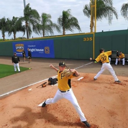 Right-hander Gerrit Cole, left, in 2012 warms up in the bullpen with Jeff Locke at McKechnie Field at Pirate City in Bradenton, Fla.