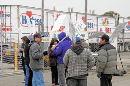 Striking workers picket outside the Hostess bakery in Oakland, Calif. in November.