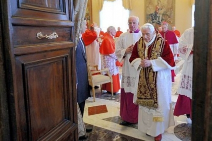 Pope Benedict XVI leaves an ordinary consistorio at the Vatican on Monday after announcing he will resign Feb. 28.