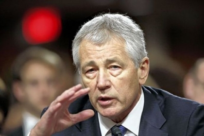 Senate Armed Services Committee votes 14-11 in favor of Chuck Hagel to be defense secretary.