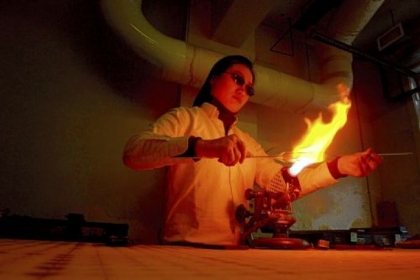 Eunsuh Choi, shown creating a piece for her exhibition at the Pittsburgh Glass Center, will teach a class there June 3 to 7 on her special application of flameworking.