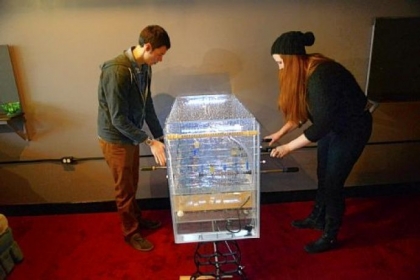 Nick Barletta and Corinne Hogge work a foosball machine at PLAY Parlour in Lawrenceville.